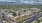 a large building with a parking lot in Tucson